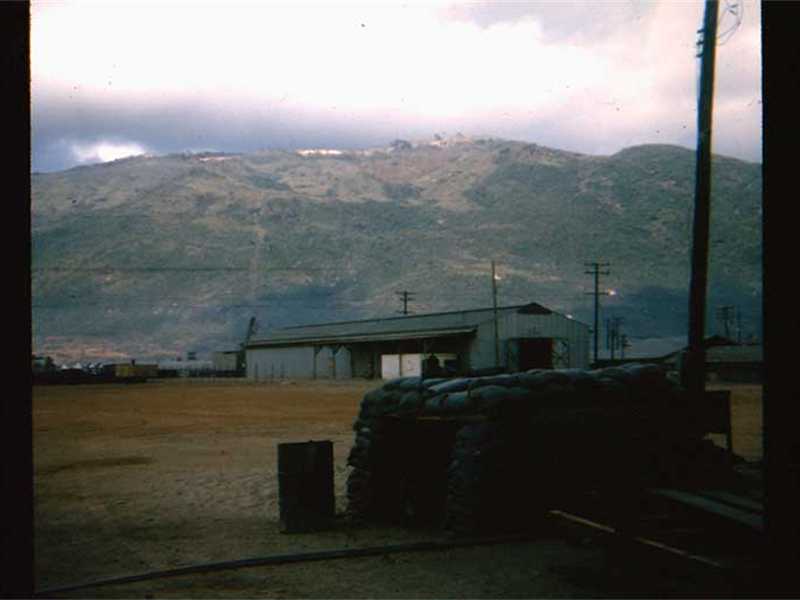 Radar installation (top of mountain) at Qui Nhon  AFB w/bunker in foreground