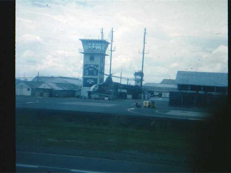 Bien Hoa AFB with helicopter taking off.